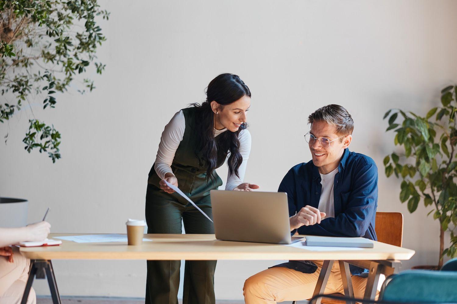 woman and man working